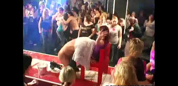  Babes at a huge party give blowjobs on stage